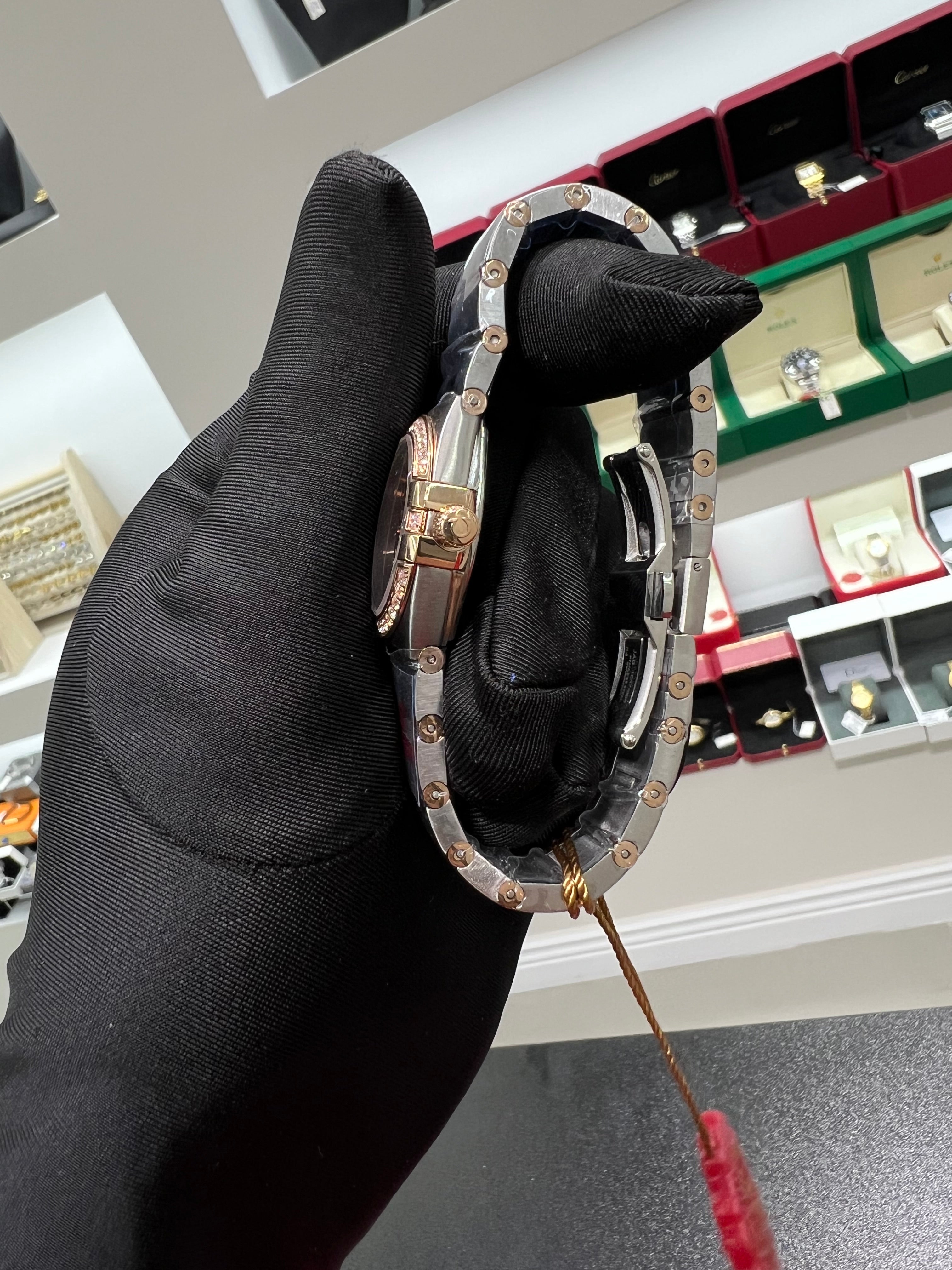 Constellation watch with a shiny honey-colored dial