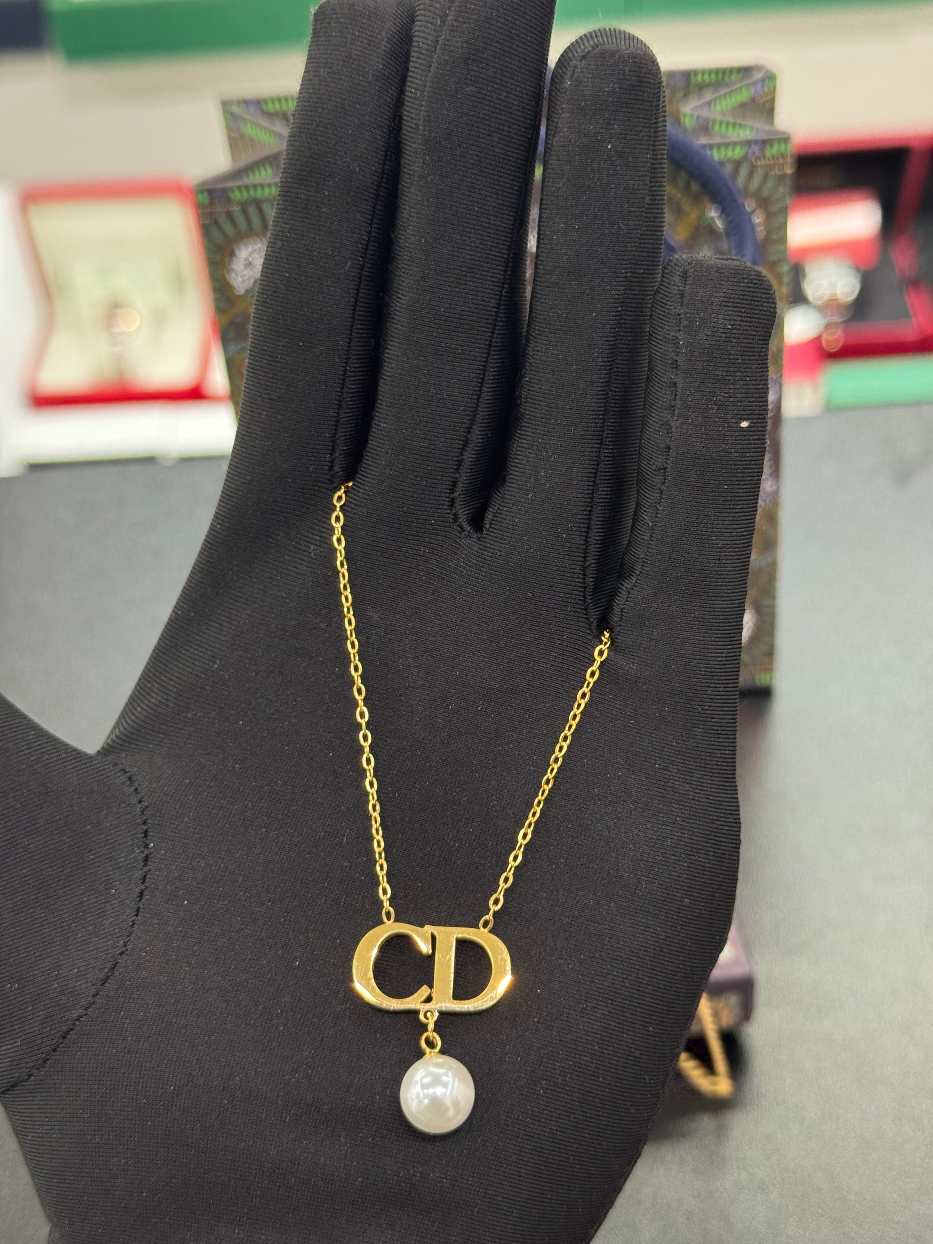 طقم CD لؤلؤ المتدلي بلخاتم