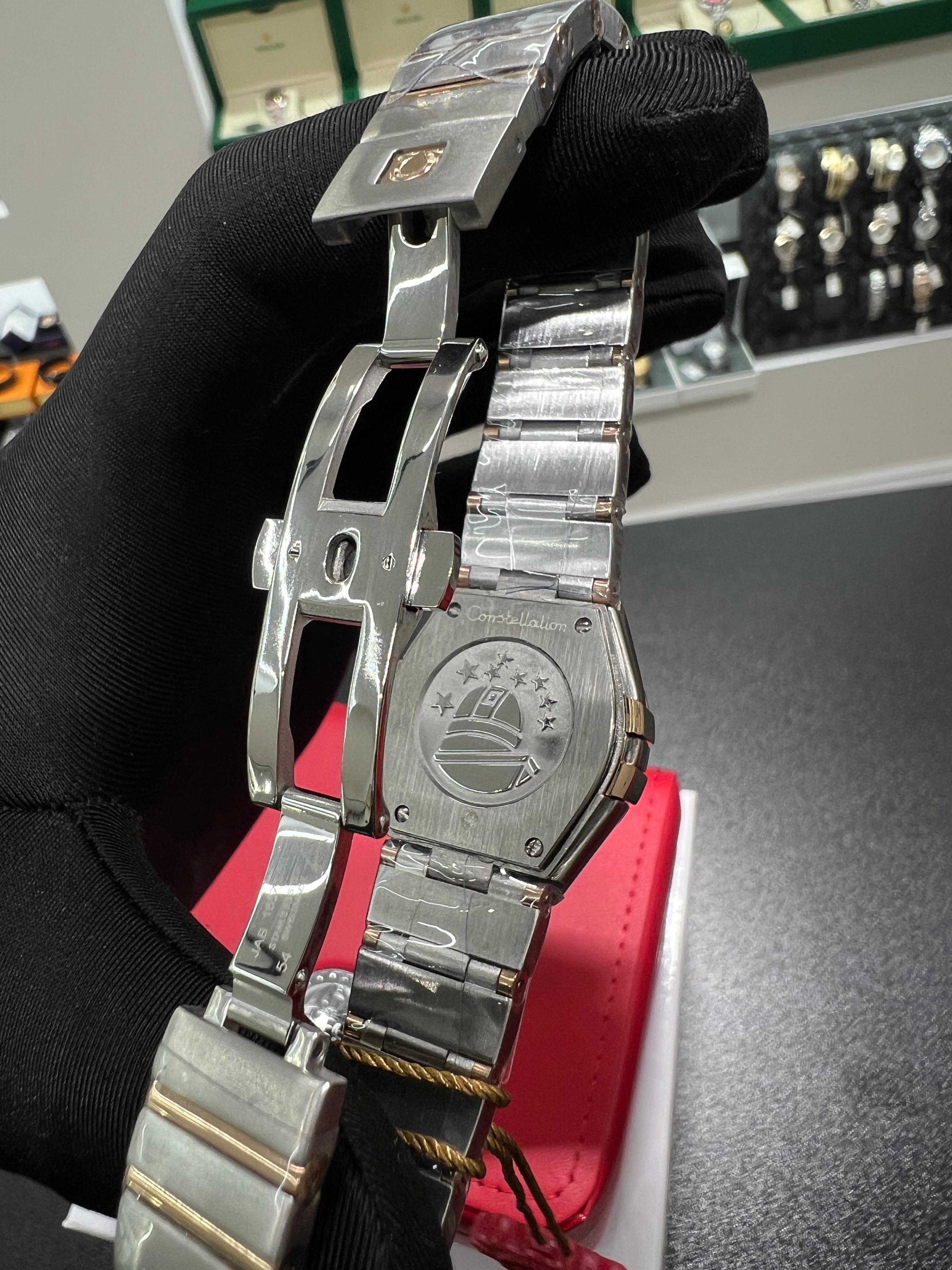 Constellation watch with a shiny honey-colored dial