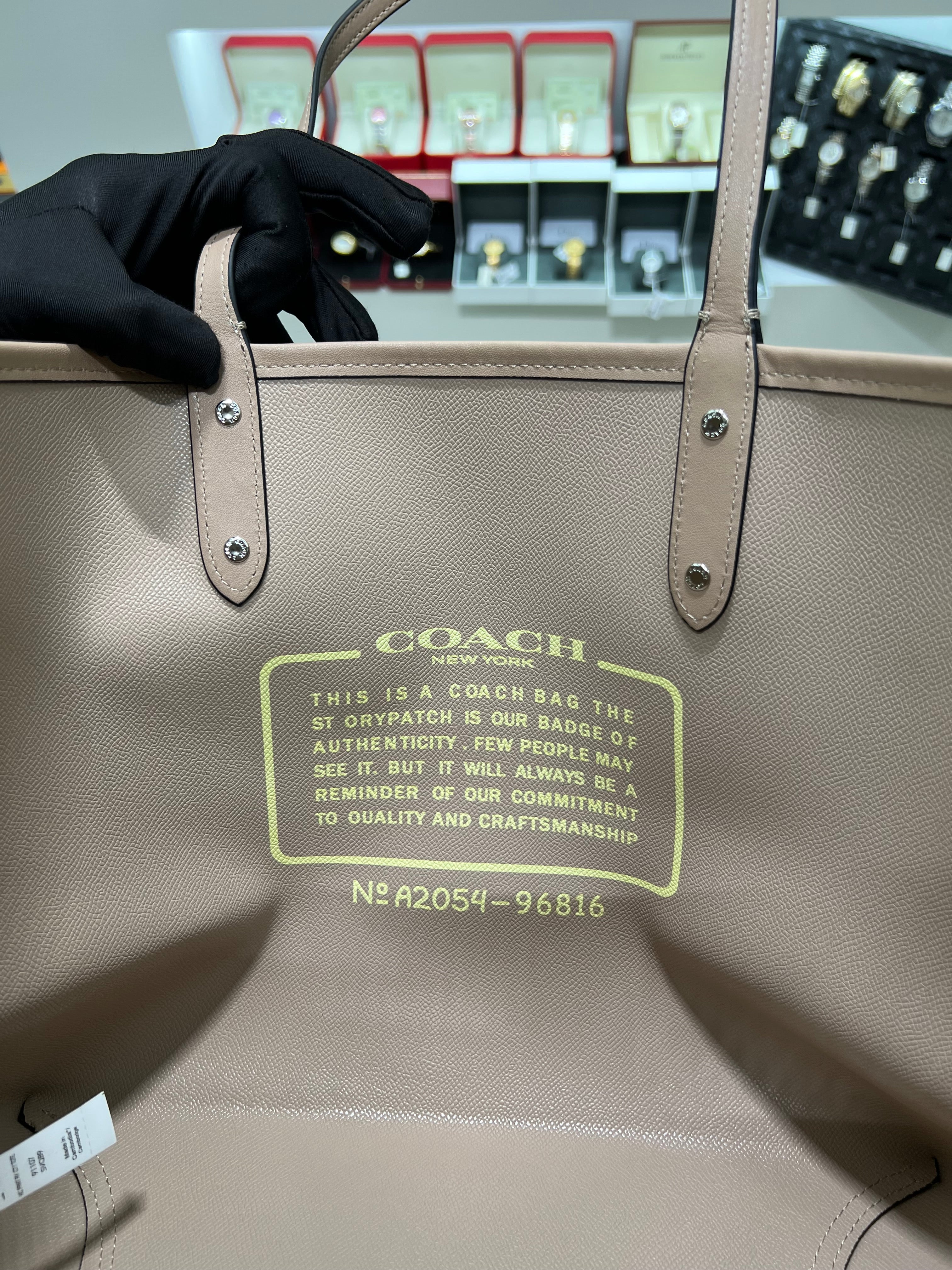 Cöach Reversible City Tote with Horse and Carriage Print".