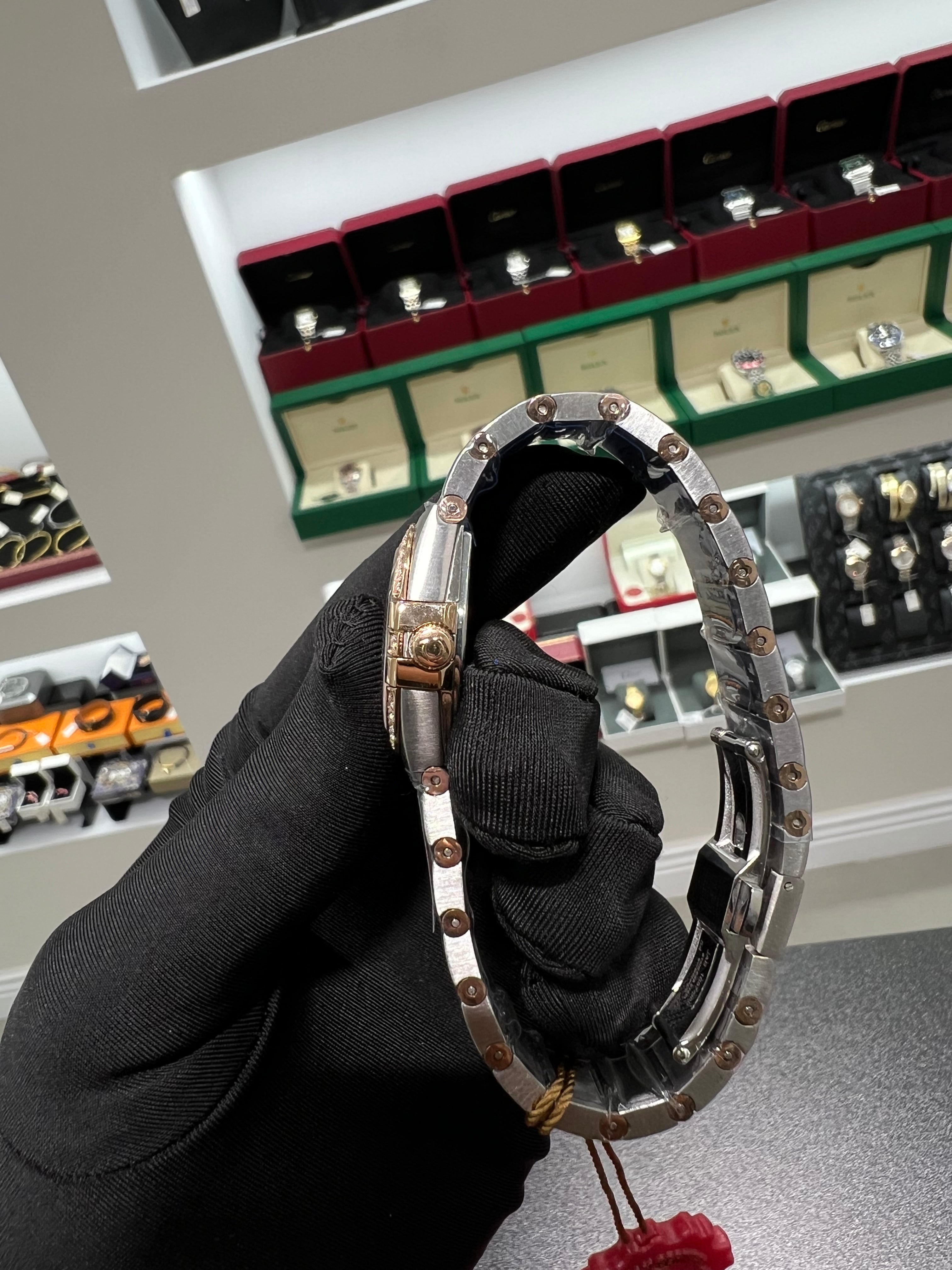 Constellation watch with a shiny honey-colored dial