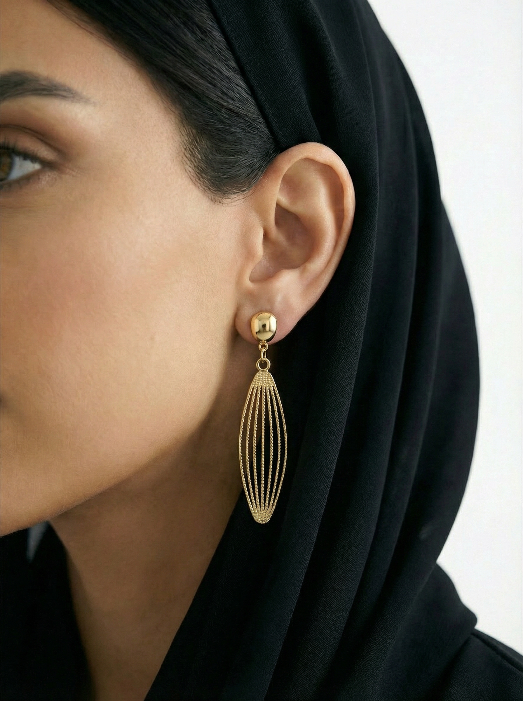 أقراط أذن الريشه الذهبيه