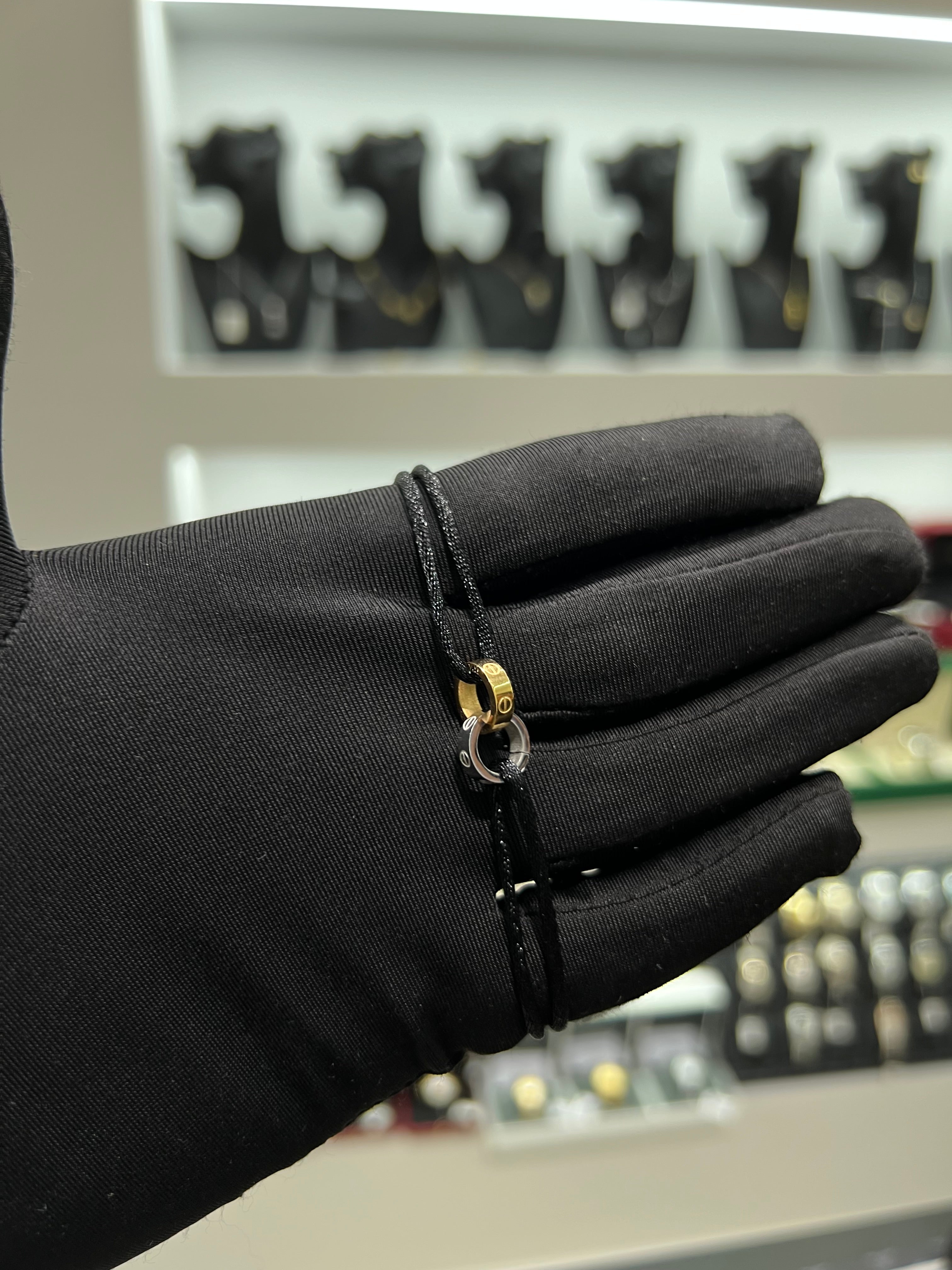 كارتير خيط اسود حلقتين ذهبي في الفضي