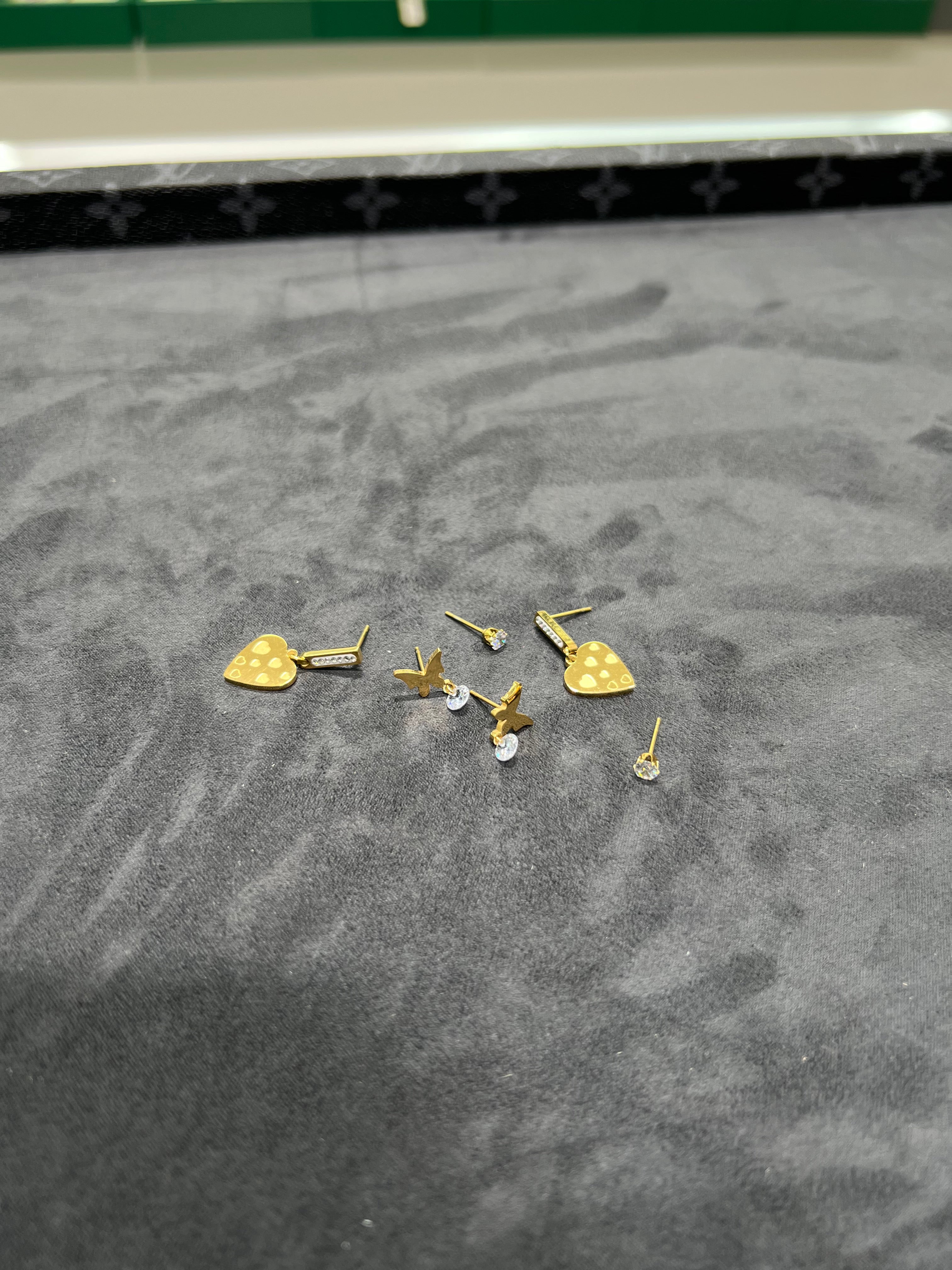 أقراط أذن الفراشه التلاثيات