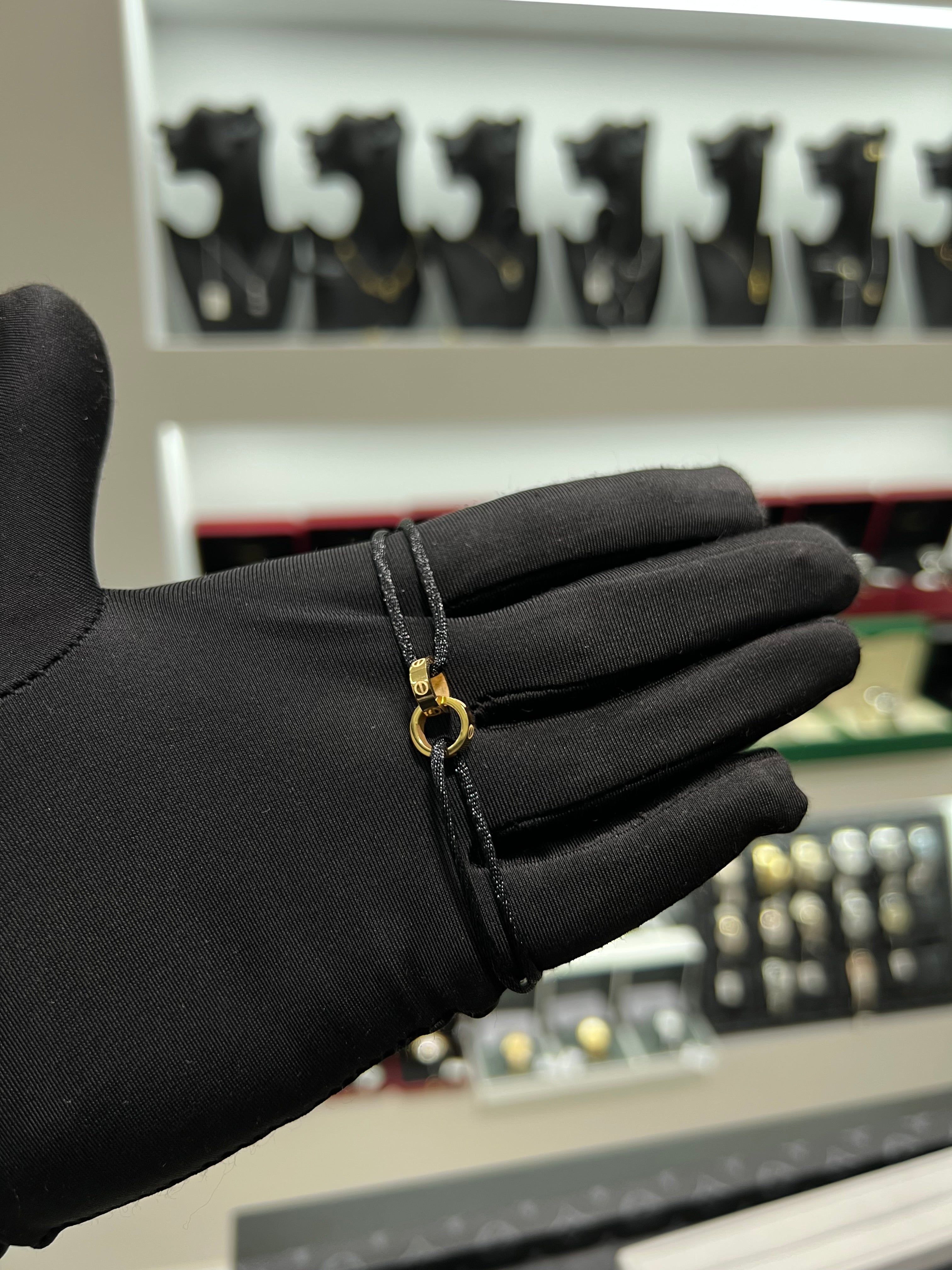 كارتير خيط اسود حلقتين ذهبي