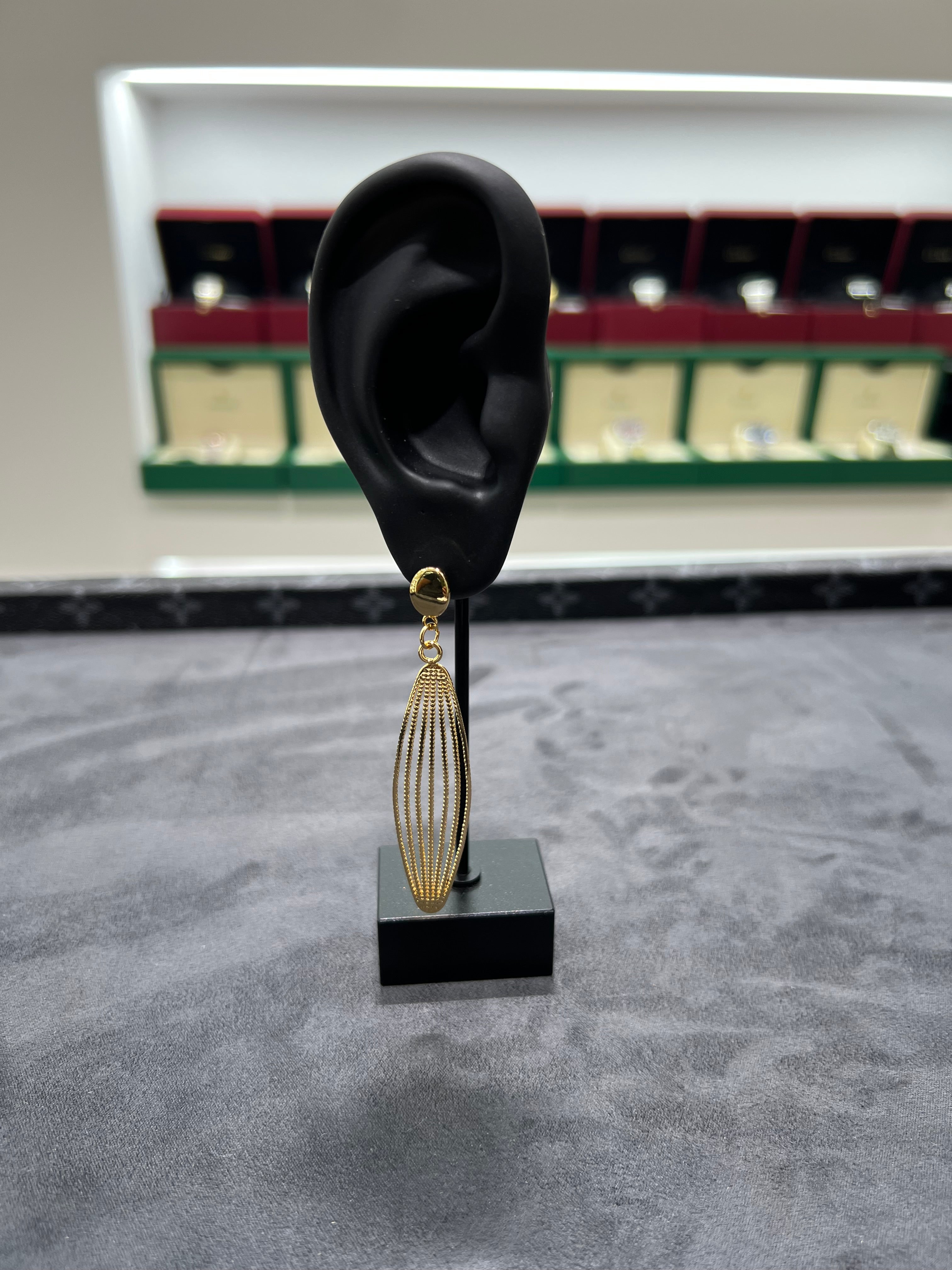 أقراط أذن الريشه الذهبيه