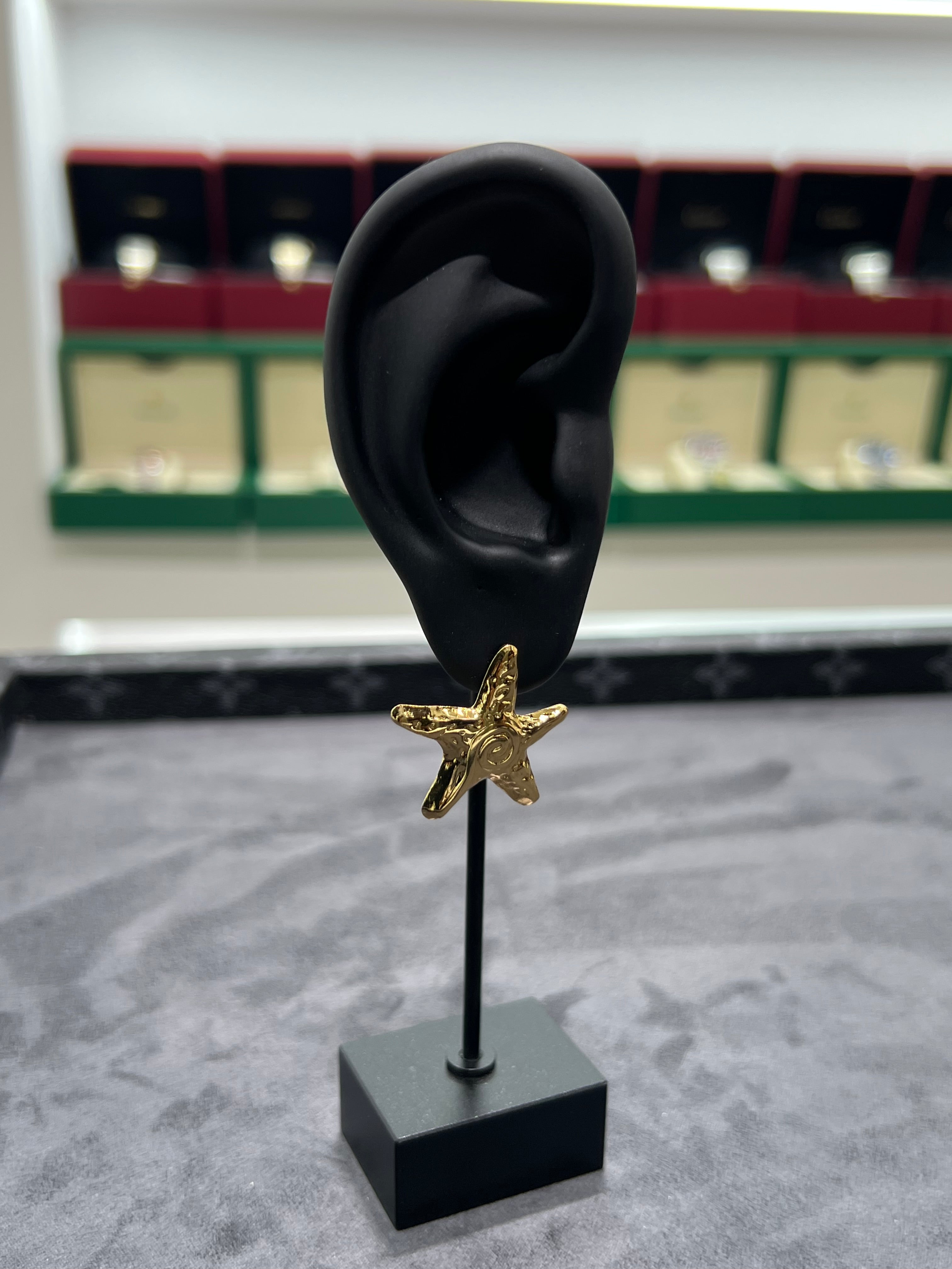 اقراط اذن النجمه