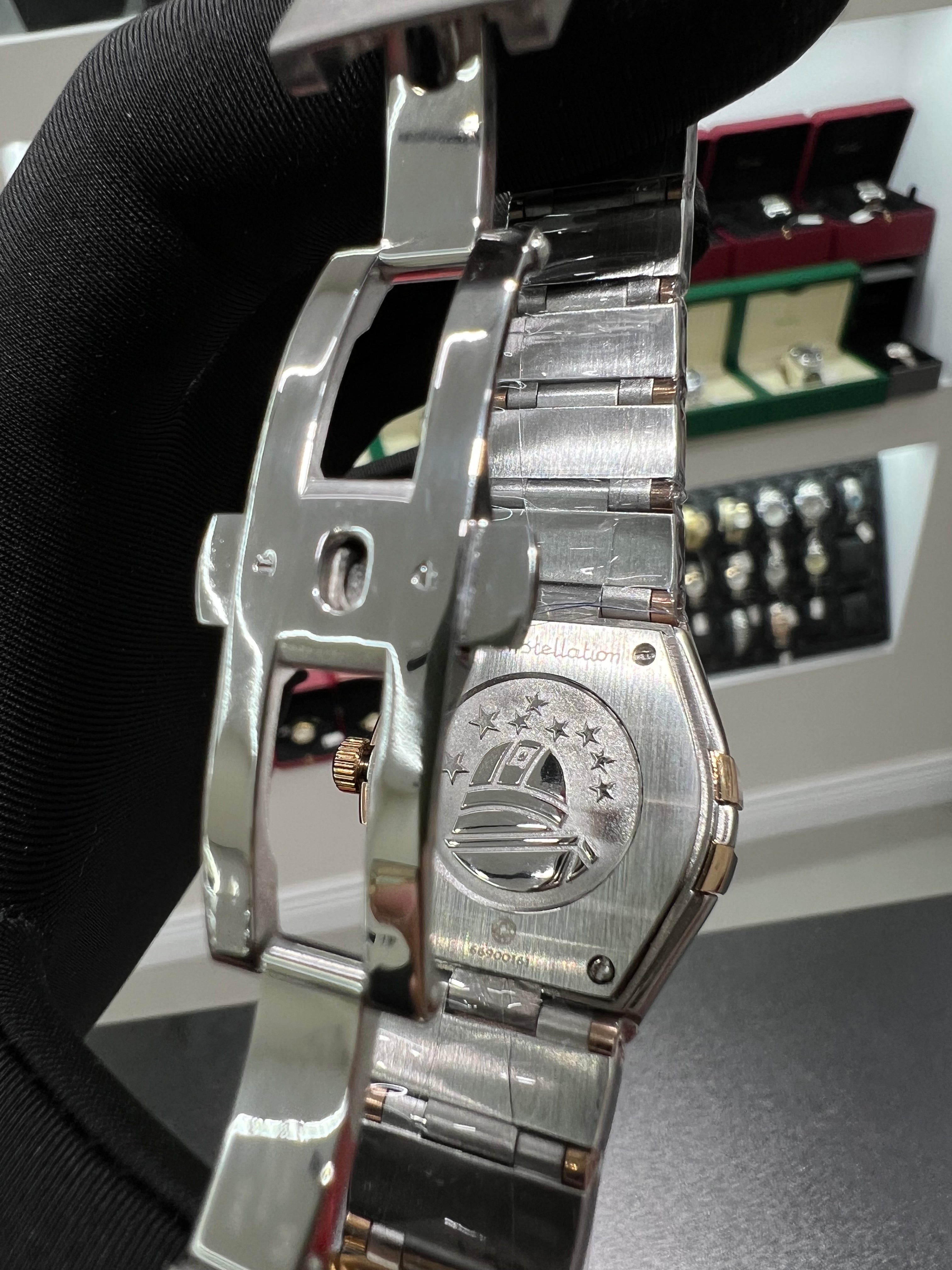 Constellation watch with a shiny honey-colored dial