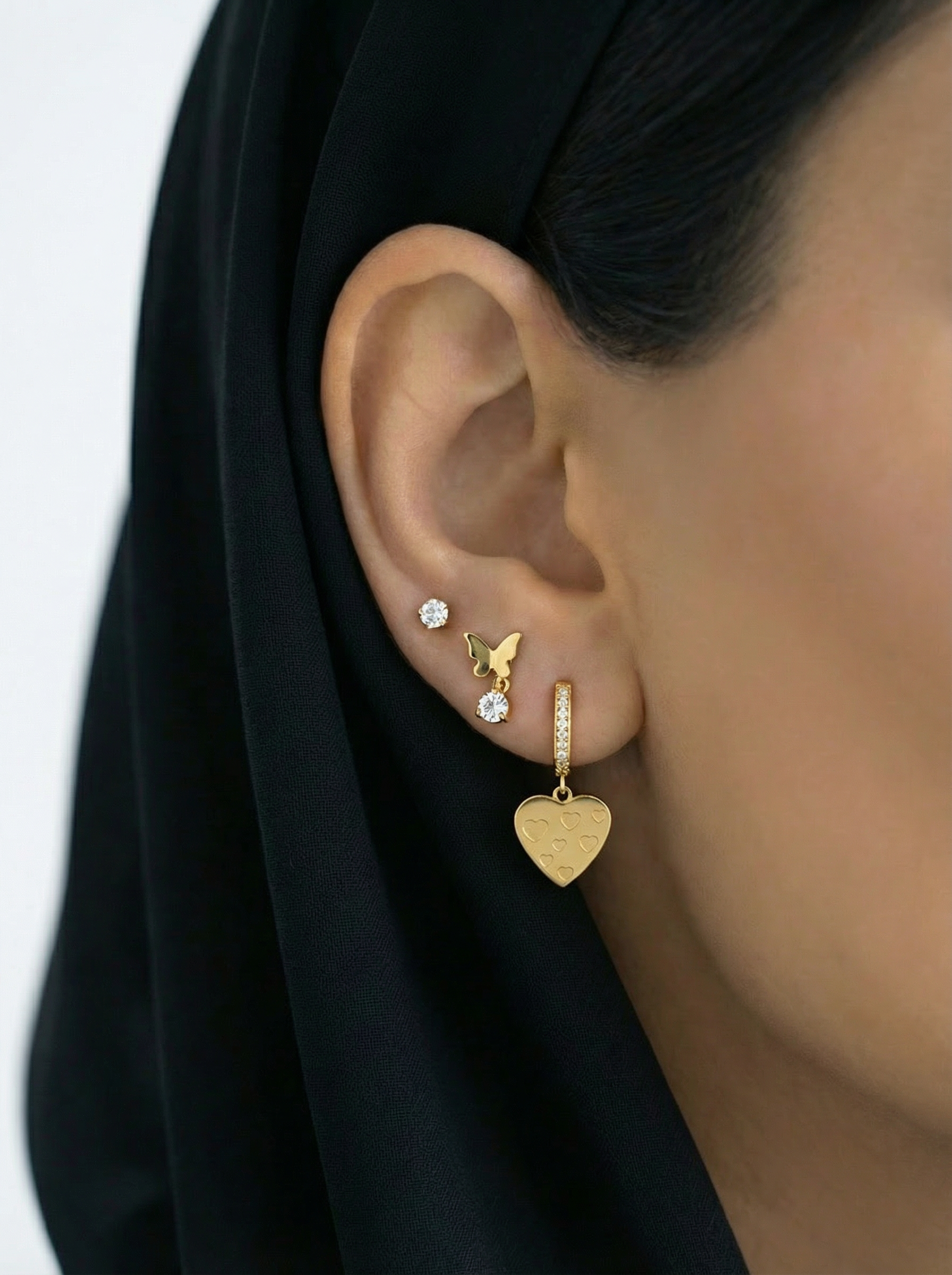 أقراط أذن الفراشه التلاثيات