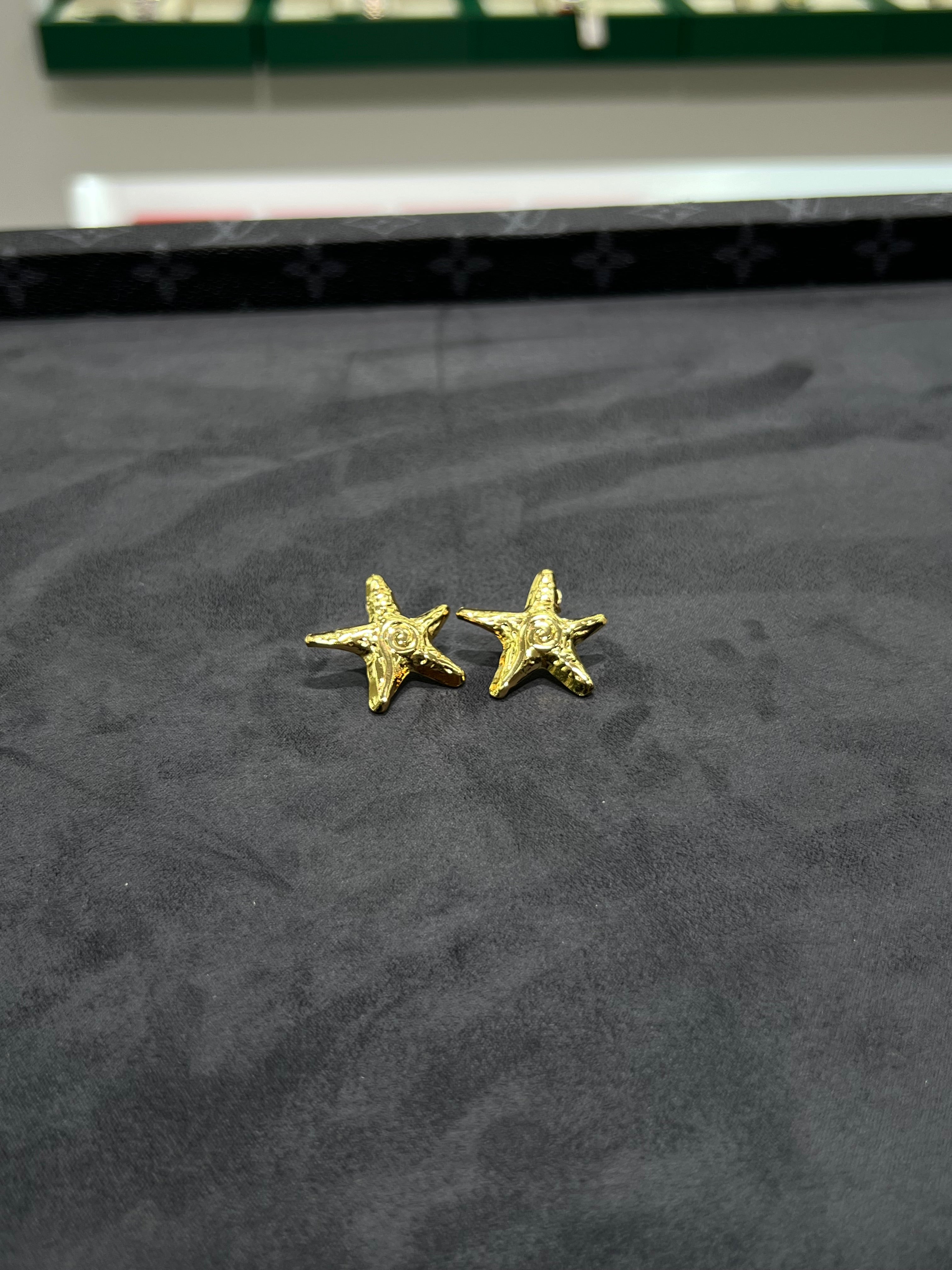 اقراط اذن النجمه