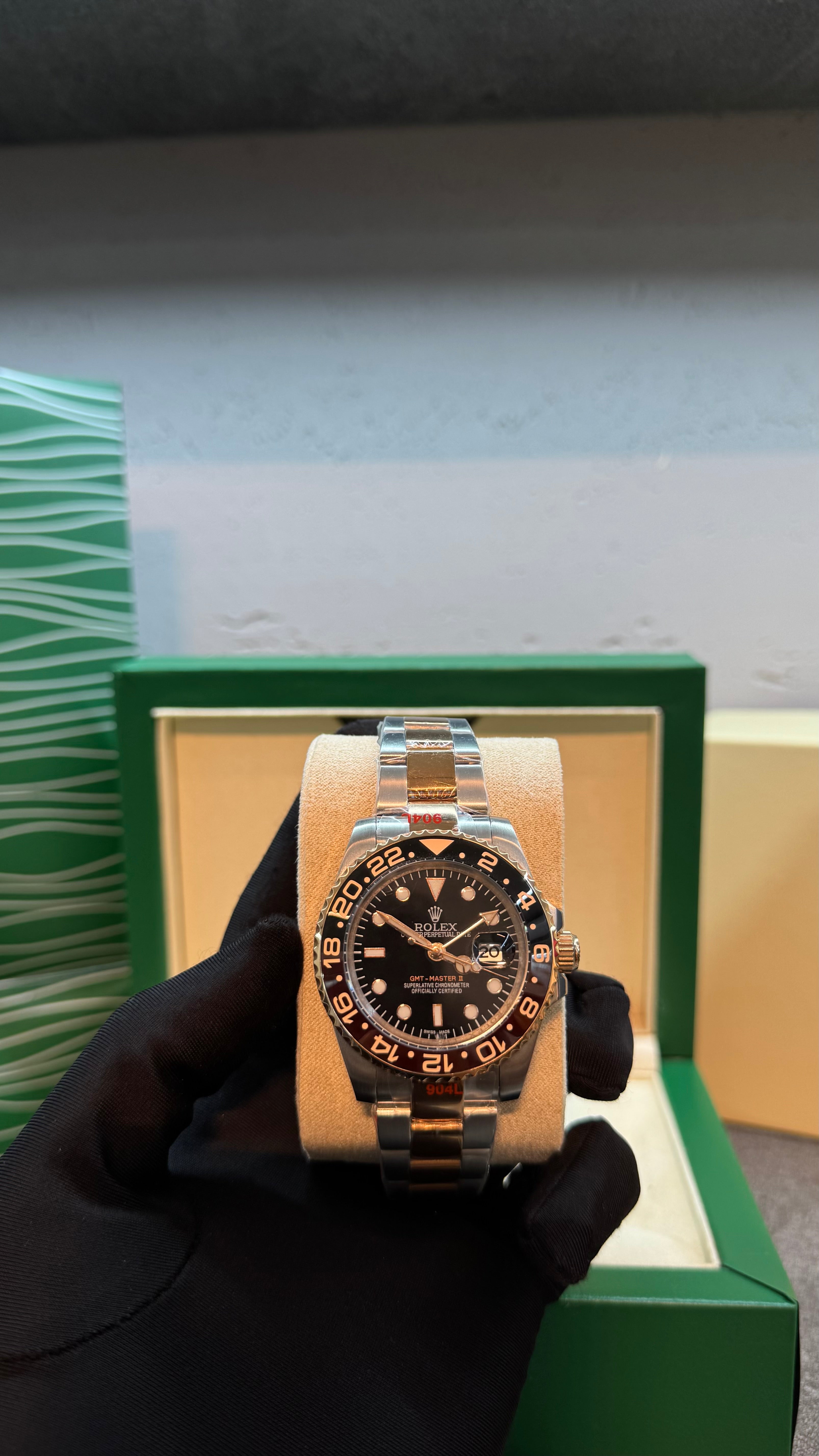ساعة Root Beer روت بير ثنائية اللون بمينا أسود وإطار سيراميك بني — ستانلس وذهبي | Root Beer Two-Tone Watch