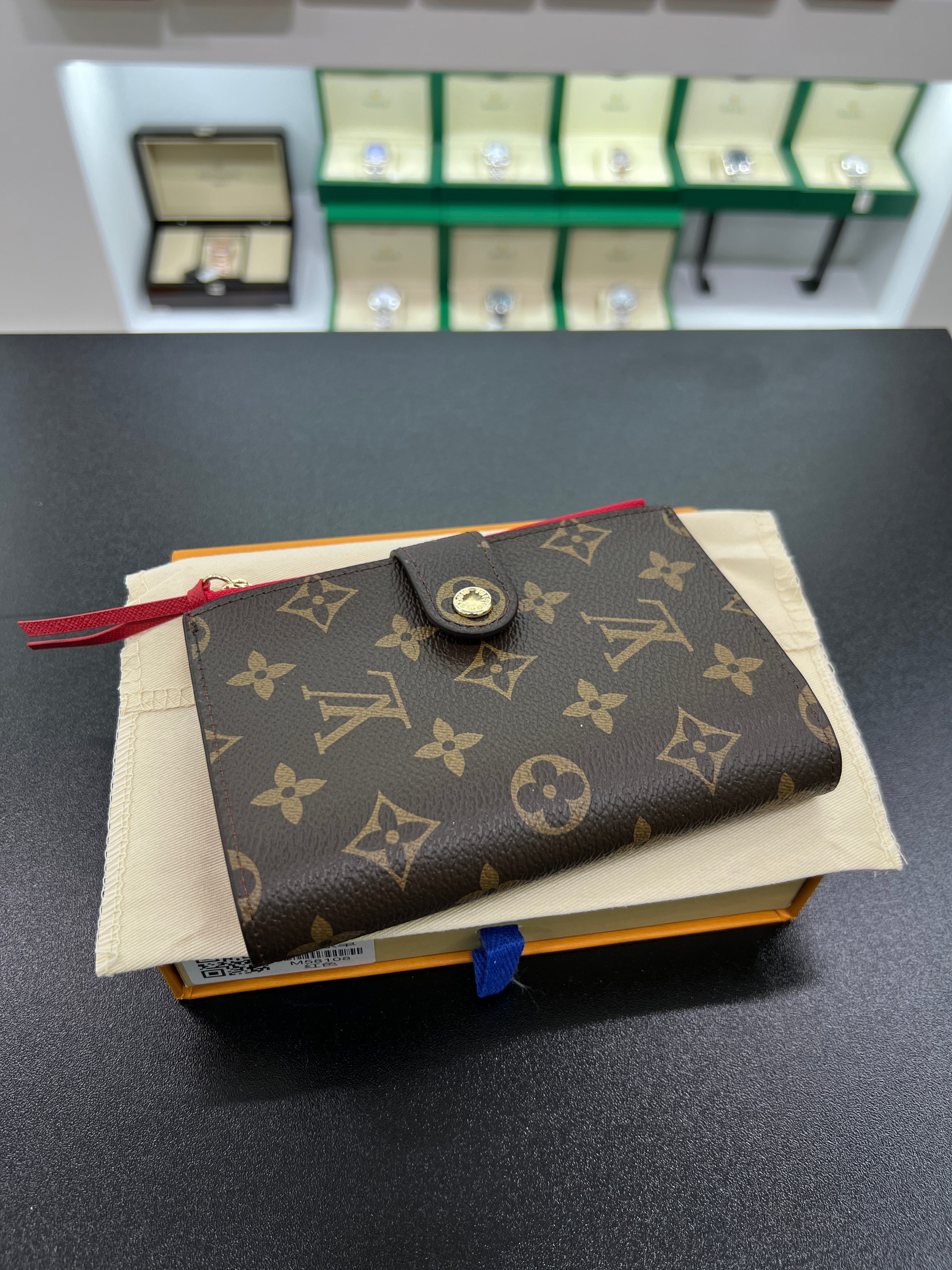 Victorine Wallet – Monogram Canvas with Red Interior