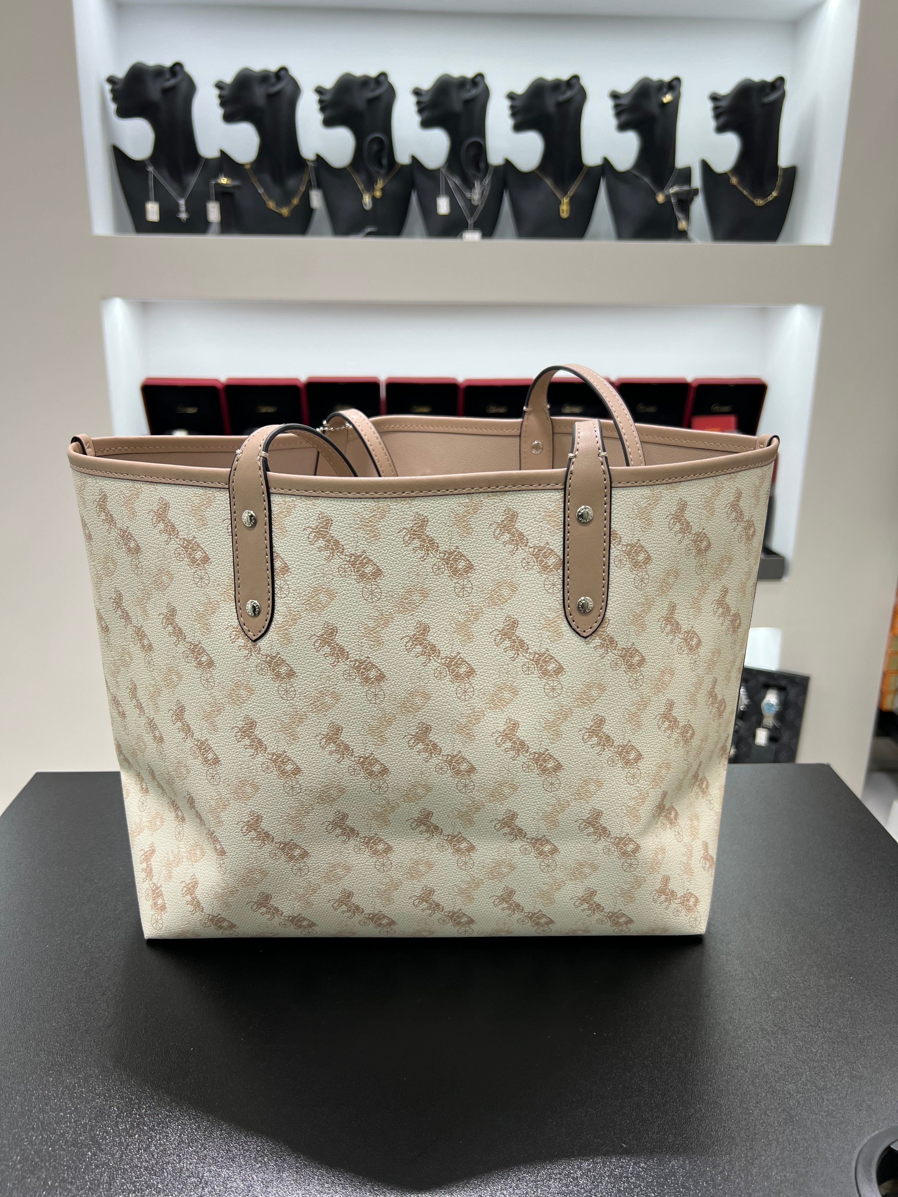 Cöach Reversible City Tote with Horse and Carriage Print".