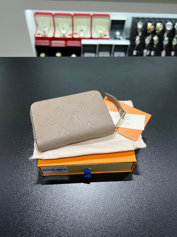 Monogram Empreinte Leather Beige color