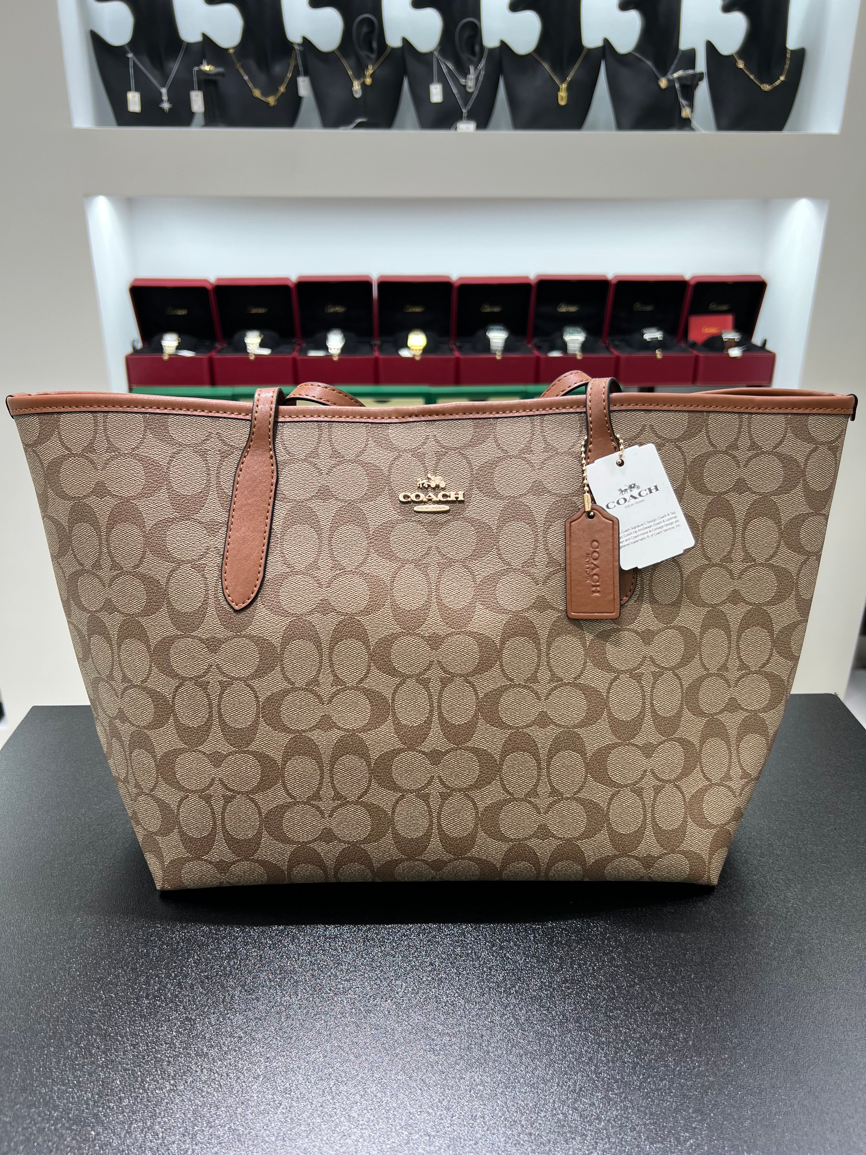 Cöach City Tote in Signature Canvas.